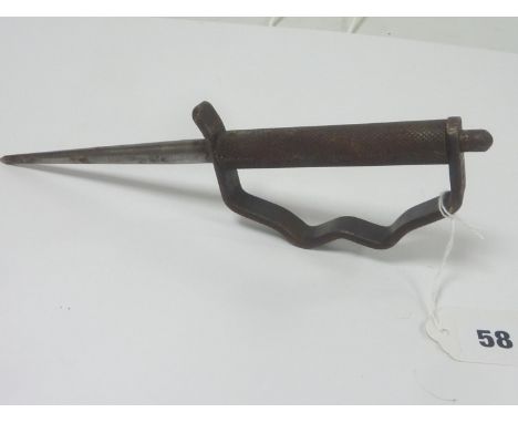 Spiked knuckleduster dagger in steel, with 6 in. spike blade with blood groove. 11 ins. overall. Probably WW I made on campai