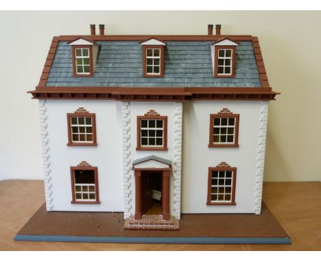 Dolls house. In the Georgian style, white &amp; terracotta finish, includes various contents, tile effect base is 102cm long,