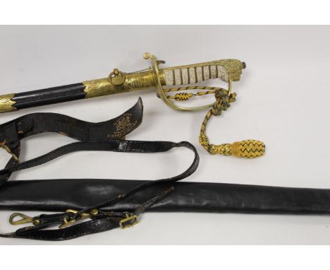 Naval officer's dress sword. Engraved blade, King's crown. In brass and leather scabbard. With foul weather cover and sword b