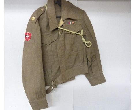 British Army British Army battle dress blouse with Coultas and Son interior label dated 1941, with 14th Army cloth shoulder b