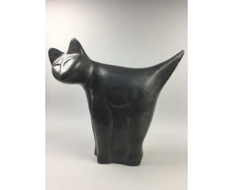 GLAZED TERRACOTTA MODEL OF A STANDING CAT,of large proportions, 46cm high