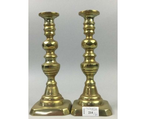 PAIR OF BRASS CANDLESTICKS,16cm high, along with a silver candlestick, also a smaller pair of candlesticks, copper jug and ot