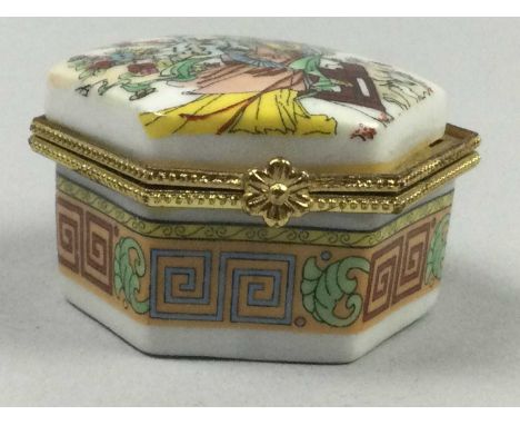 COLLECTION OF CERAMIC AND METAL PILL BOXES,including enamel topped, one featuring a golfer, one a frog and another a geisha (