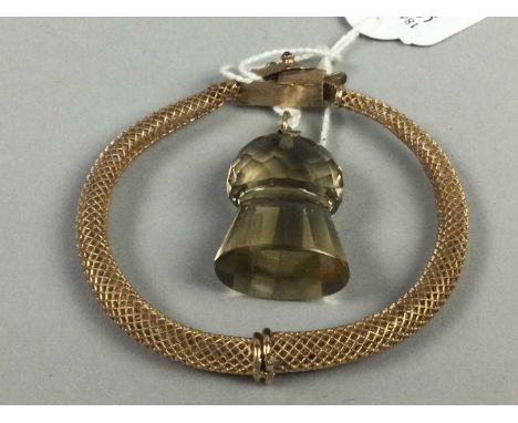 CITRINE FOB IN THE FORM OF A THISTLE,along with a snake form bangleFob in overall good condition no major noticeable damage p