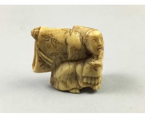 JAPANESE IVORY NETSUKE,Meiji period, modelled as a male actor, 2.3cm high