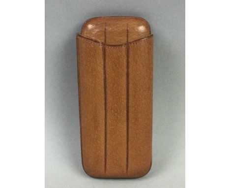 STITCHED LEATHER CIGAR POUCH COMOY'S OF LONDON,three division, along with a faux tortoiseshell cigarette box, white metal mou