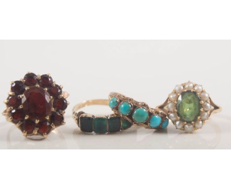 Four dress rings, a Victorian five stone turquoise ring, an eleven stone garnet cluster ring, a half hoop ring set with green