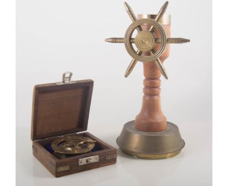 Re-cast brass sextant, another boxed compass, table compass, gimballed led compass.