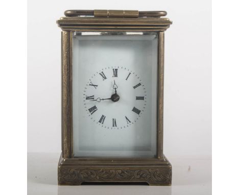 French brass carriage clock, rectangular enamel dial with Roman numerals, non striking movement, height 16cms.