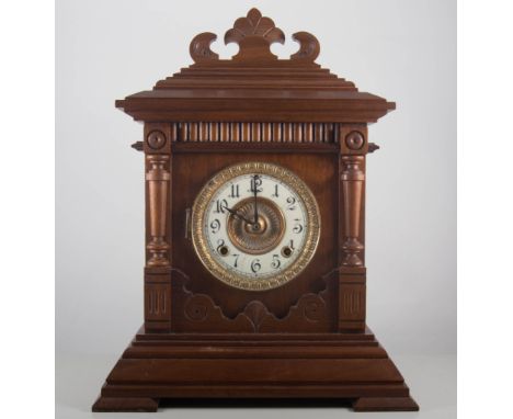 American walnut shelf clock, circular dial, leather case with bracket feet, height 44cm.