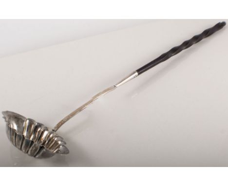 18th Century embossed silver punch ladle, with whale bone twisted haft, twisted haft, marks worn, length 38cm.