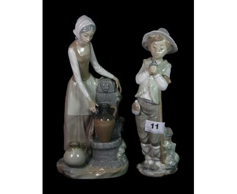 Two Nao figures of a boy with a bird and a girl drawing water, H. 27 & 30cm.