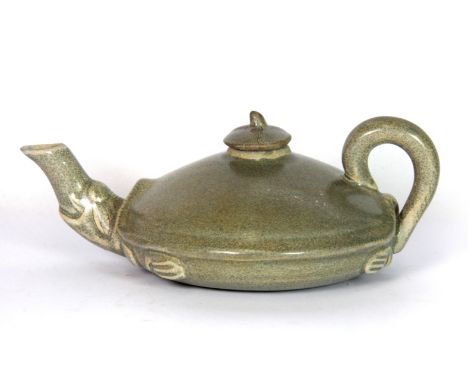 A Chinese celadon glazed porcelain teapot in the form of a turtle, L. 17cm.