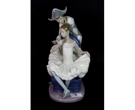 A large Nao figure of a Pierrot and a ballet dancer, H. 30cm.