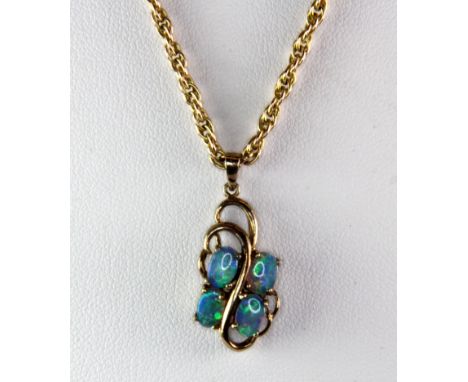 A 14ct yellow gold (stamped 14k) blue opal set necklace (approx. 9.7gr).