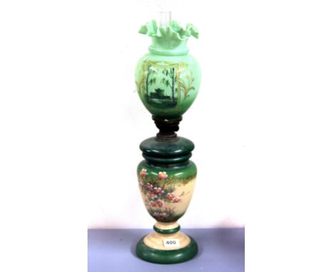 A 19th century hand painted opaline glass oil lamp and shade, H. 57cm.