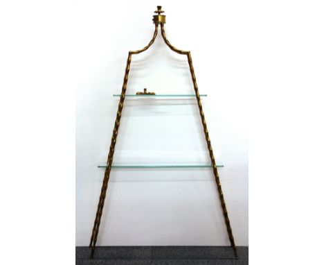 A gilt brass bamboo design glass shelf unit, H. 104cm.