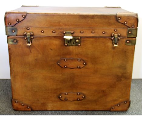 A studded leather trunk, 61 x 41 x 51cm.