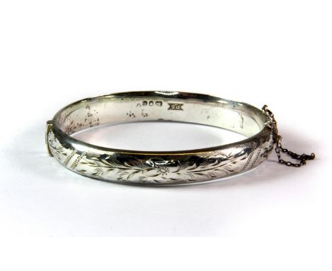 A hallmarked silver bangle, c. 1978, L. 6.5cm.