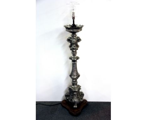 An ornate large cast metal standard lamp, H. 112cm.