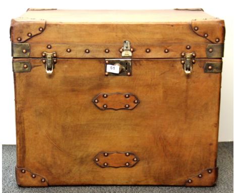 A studded leather trunk, 61 x 41 x 51cm.