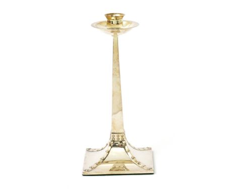 A James Dixon & Sons electroplated candlestick, tapering square base with rivet and strapwork decoration 22cm. high Literatur