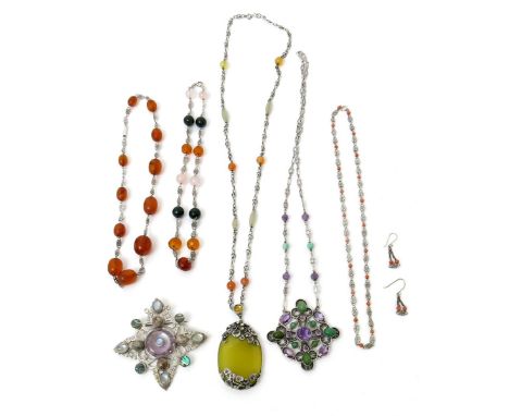 A silver pendant necklace in the manner of Amy Sandheim, pierced and cast with central cruciform pendant motif with trefoil t