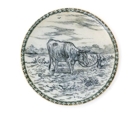 An early Doulton Lambeth stoneware plate by Hannah Barlow, circular, incised with a cow tethered to a post and grazing, two s