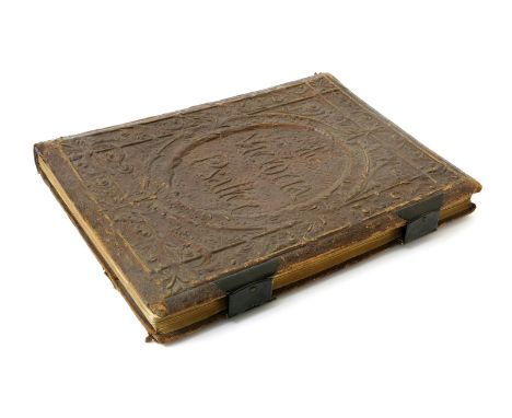 The Psalms of David illuminated by Owen Jones, an illuminated manuscript with tooled leather cover titled The Victoria Psalte