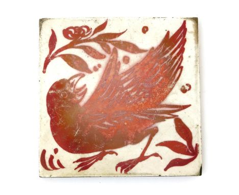 A small William De Morgan Eagle tile, on Carter's Poole blank, painted in ruby lustre with a bird amidst foliate panels, on a