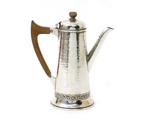 An A.E. Jones silver coffee pot, model no.712, tapering cylindrical form with simple cast entwined rose band, hammered finish
