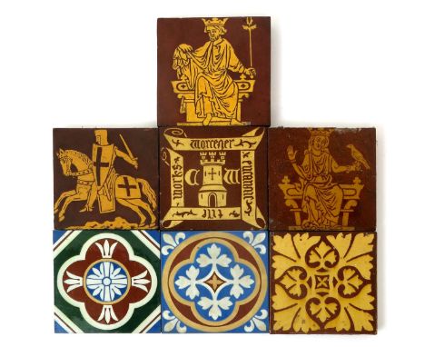 A Mintons Medieval Revival encaustic tile, decorated in yellow with a king seated on a throne, another similar and a mounted 