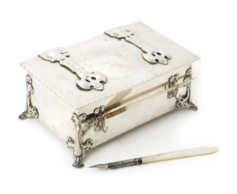A William Hutton silver double inkwell possibly designed by Kate Harris, rectangular form with hinged, overhanging cover, set