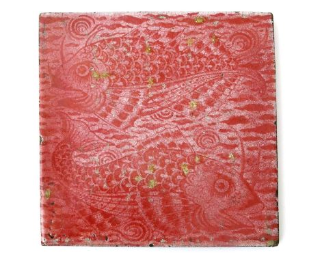A William De Morgan Sands End pottery tile, painted with two large scaly fish, in ruby on a white ground impressed marks, gla