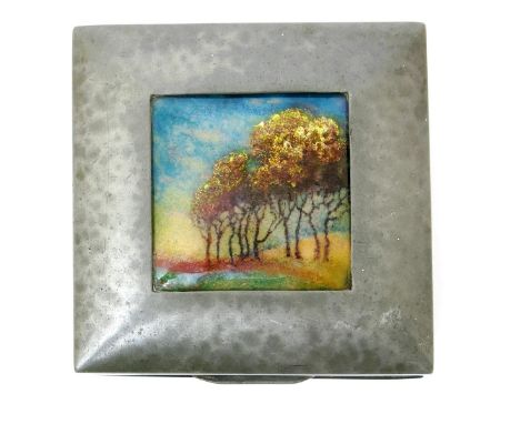 A Liberty & Co English Pewter and enamel box and cover by Charles Fleetwood Varley, the hinged cover set with rectangular pan
