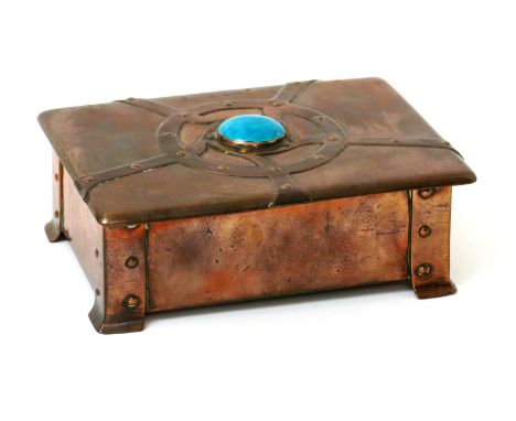 An A.E. Jones copper cigarette box and cover, rectangular section the hinged cover cast with strapwork design set with green 