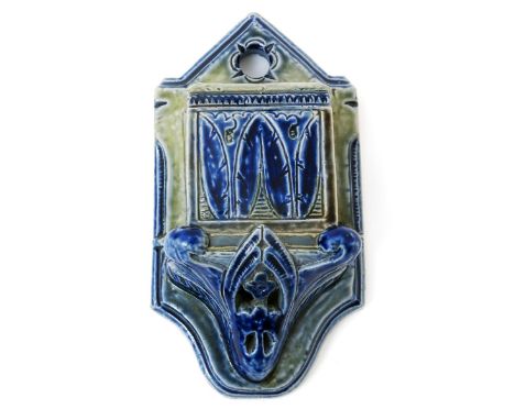 A Martin Brothers stoneware wall vesta by Robert Wallace Martin, architectural form, incised with foliage panels, in blue and