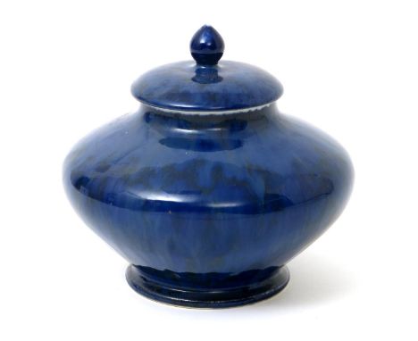 A Ruskin Pottery vase and cover designed by William Howson-Taylor, dated 1910, compressed, shouldered form, the cover with po