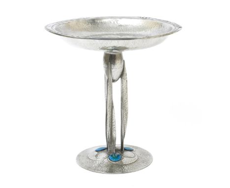 A Liberty & Co English Pewter and enamel pedestal bowl designed by Archibald Knox, model no.01161, on three winged feet, the 