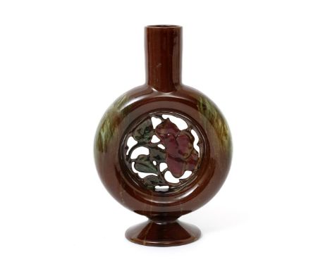 A rare Linthorpe vase designed by Dr Christopher Dresser,  the tube vase with central pierced foliate roundel, glazed brown w