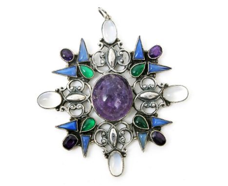 A silver pendant necklace the design attributed to Sybil Dunlop, pierced wirework frame set with amethyst, moonstones and oth