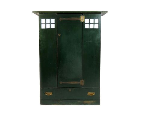 A Guthrie & Wells green painted wardrobe in the style of Charles Rennie Mackintosh, architectural form, the tapering rectangu