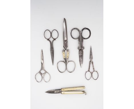 Two sets of Victorian patent folding scissors, one having Ivorine grip scales, and four further 19th Century steel scissors