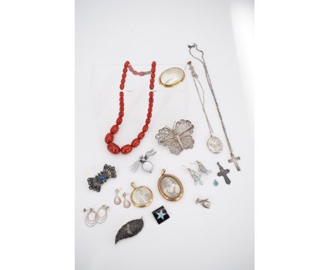 A quantity of vintage silver and costume jewellery, including a filigree butterfly brooch, rolled-gold pendant lockets, a fau