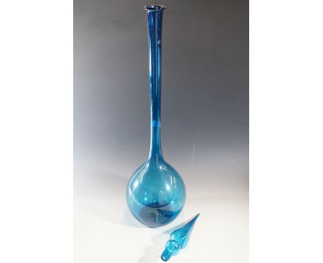 A vintage ultramarine blue free-blown glass pharmacist type bottle, of elongated tear-drop shape with spire stopper, 95 cm