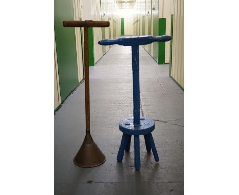 A vintage poss stick and dolly