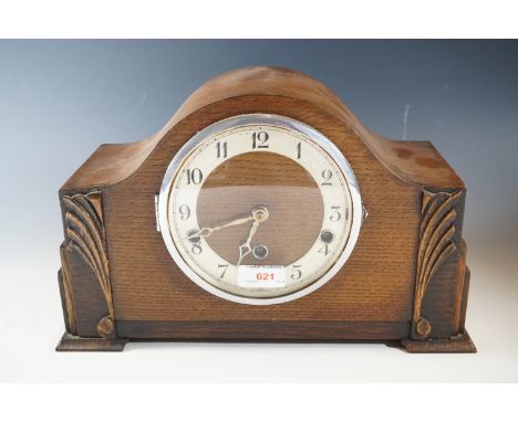 A oak mantle clock
