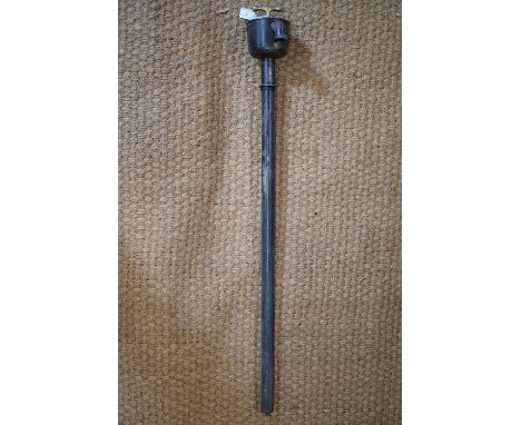 A vintage oil drum pump