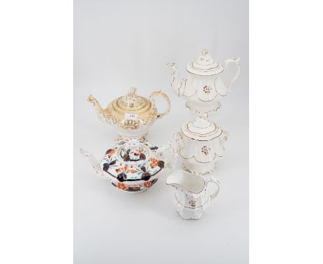 Early 19th Century tea wares, including a matching teapot, sucrier and milk jug, an Imari style teapot, and an 1830s footed t