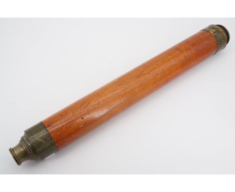 A vintage brass three-draw telescope 